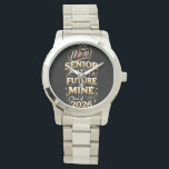 Proud Mom of a 2026 Graduate Watch<br><div class="desc">Celebrate your senior’s big achievement with this dazzling design! Featuring bold gold lettering,  graduation caps,  and sparkling accents,  this shirt/poster is perfect for proud moms cheering on the Class of 2026. A stylish keepsake for graduation day or everyday pride!</div>