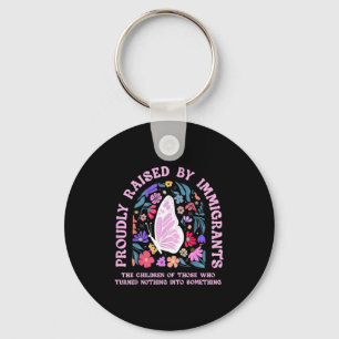 Proudly raised by immigrants butterfly floralProud Key Ring