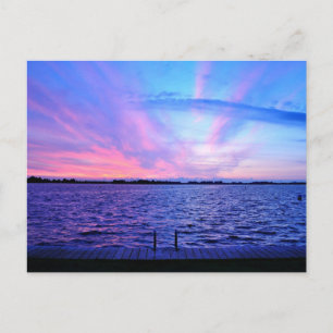 Psychedelic sunset with groovy colours postcard