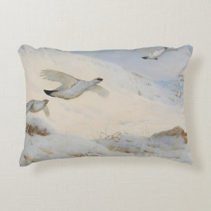 Ptarmigan in winter plumage,flying across the snow decorative cushion