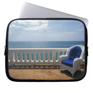 Puerto Rico. Wicker chair and tiled terrace at Laptop Sleeve