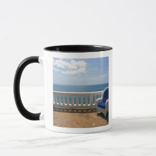 Puerto Rico. Wicker chair and tiled terrace at Mug