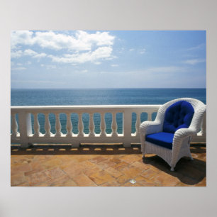 Puerto Rico. Wicker chair and tiled terrace at Poster