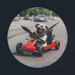 Pug go-kart racing round clock<br><div class="desc">Cute Pug go-kart racing.</div>