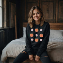 pumpkin and flowers in autumn sweatshirt