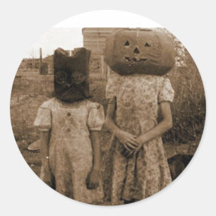 Pumpkin girl with the black sack classic round sticker