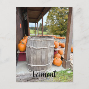 Pumpkins and barrel by a farm holiday postcard