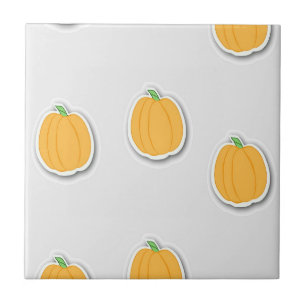 Pumpkins on  grey ceramic tile