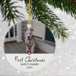 Puppies First Christmas Photo Ceramic Ornament<br><div class="desc">Puppies First Christmas holiday ornament. Design futures your favourite photo,  decorative accent paw print with knock out heart in red and whimsical lettering.</div>