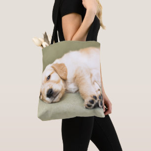 Puppy Lying Down On Sofa Tote Bag
