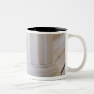 Puppy peeking out from behind a column Two-Tone coffee mug