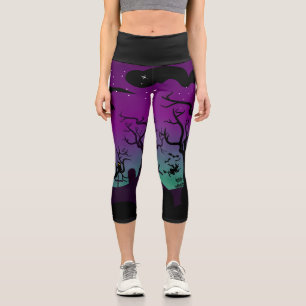 Purple and aqua blue haunted graveyard Halloween Capri Leggings