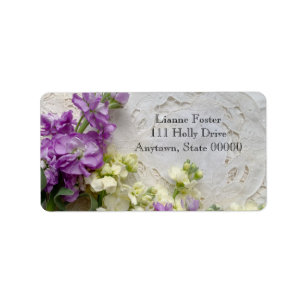 Purple and white flowers on old laces label
