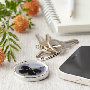 Purple and white pansy key ring