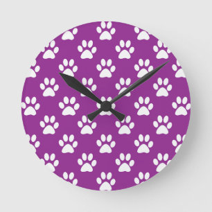 Purple and white paw prints pattern round clock