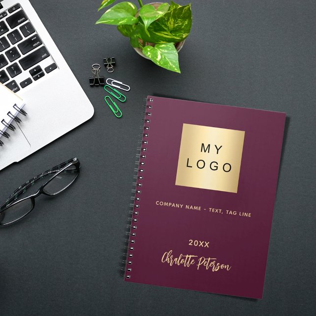 Purple business logo elegant monogram notebook (Creator Uploaded)