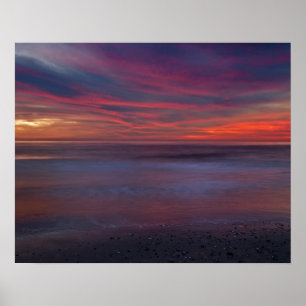 Purple-coloured sunrise on ocean shore poster