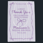 Purple Coquette Bow Pastel Bridal Shower Favour Medium Gift Bag<br><div class="desc">Add a touch of playful charm to your celebration with our Coquette Bow Party Decor Collection. Featuring a hand-drawn coquette bow doodle on a dreamy pastel striped background, this grandmillennial-inspired design is perfect for creating a soft, sweet party scene. The pastel purple palette and whimsical bow details bring a feminine...</div>