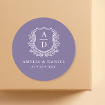 Purple Crest Floral Modern Monogram Wedding  Classic Round Sticker<br><div class="desc">Elevate your wedding details with our Purple Crest Floral Modern Monogram Wedding Classic Round Sticker. Featuring a stylish floral crest design in rich purple tones paired with a clean, modern monogram, this versatile sticker adds a sophisticated touch to invitations, favours, or thank you cards. The elegant blend of botanical elements...</div>