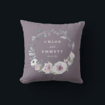 Purple Floral Bridal Wedding Couple Cushion<br><div class="desc">Elegant and chic blush purple flowers create a beautiful wreath. It frames the wedding couple's names and wedding date. The newlyweds will love using this lovely reminder of their special day. This personalised wedding pillow is part of the Blush Violet collection. It contains many gift ideas for the newlyweds, bridal...</div>