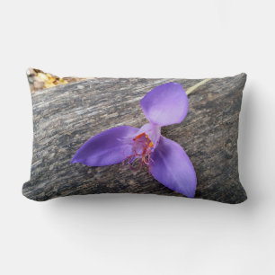 Purple flower on a bench lumbar cushion