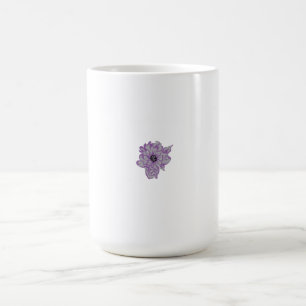 Purple flower with grey polka dot pattern and blac coffee mug