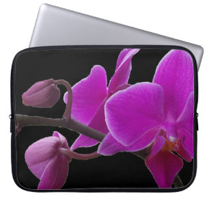 Purple orchids on black laptop sleeve