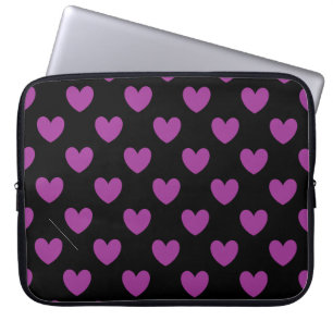 Purple polka hearts on black laptop sleeve