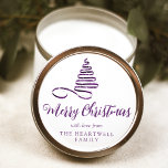 Purple Ribbon Tree Merry Christmas Script Classic Round Sticker<br><div class="desc">This modern holiday sticker features a shiny purple ribbon in the shape of a Christmas tree decorated with sparkly silver glitter. The words "Merry Christmas" appear below in stylish purple calligraphy script. Personalise it with your family's name in serif font.</div>