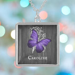 Purple Rustic Butterfly Personalised Locket Necklace<br><div class="desc">Create a unique gift for her with a Purple Rustic Butterfly Personalised Silver Plated Necklace. Necklace design features a butterfly against a white leaf vine and dark grey wooden background with a place to personalise with your name. Additional items available with this design as well. Please contact me directly for...</div>