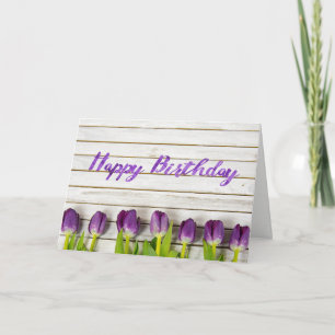 purple tulips on wood card