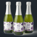 Purple White Floral Glitter 40th Birthday Name Sparkling Wine Label<br><div class="desc">Elegant birthday party custom mini sparkling wine bottle labels for women with pretty white and purple hand-painted flowers and sage green leaves accented with gold glitter. Personalised with her name and party date along with her age. Text is fully customisable and can be changed for any event you are planning....</div>