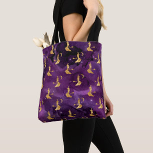 PURPLE WITH GOLD HALLOWEEN WITCHES ON A BROOM TOTE BAG