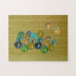 Puzzle - Glass marbles on bamboo floor