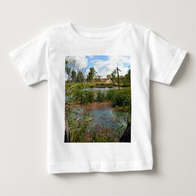 Quiet Serenity: A Green Frog on Reeds at the Swamp Baby T-Shirt (Front)