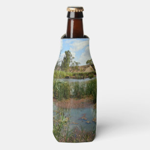 Quiet Serenity: A Green Frog on Reeds at the Swamp Bottle Cooler