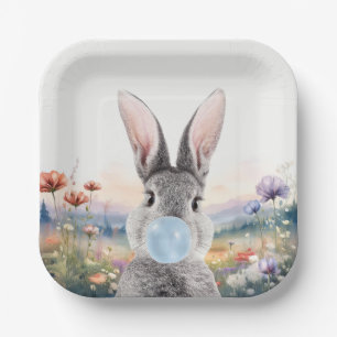Rabbit blowing blue bubble gum with wildflowers paper plate