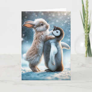 Rabbit Hugging a Penguin Holiday Card