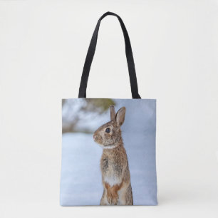 Rabbit in the snow tote bag