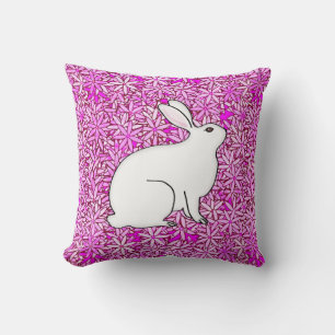 Rabbit on a bed of spring flowers cushion