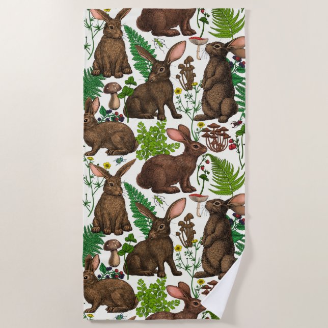 Rabbits and woodland flora 4 beach towel (Front)