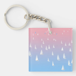 Racing sailboats in the open sea key ring