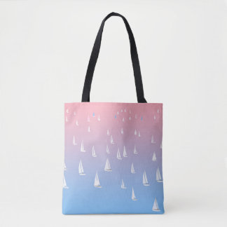Racing sailboats in the open sea tote bag