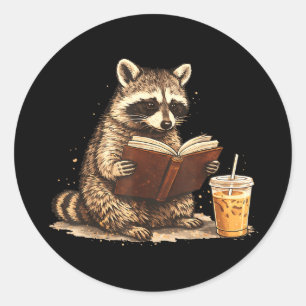 Racoon drinking iced coffee & reading book classic round sticker