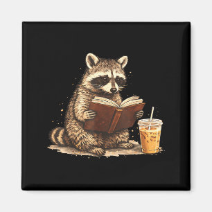 Racoon drinking iced coffee & reading book magnet