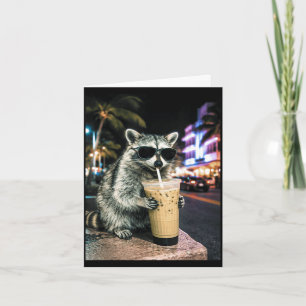 Racoon drinking iced coffee in miami streets funn card
