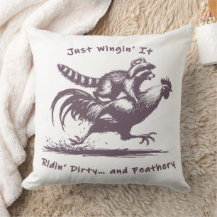 Racoon Riding Rooster – Barnyard Rodeo Cowboy Cushion