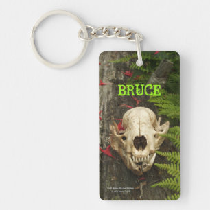 Racoon skull old log with ferns and red Monarda Key Ring