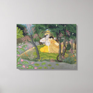 Radha and Krishna embrace in a grove of flowering Canvas Print