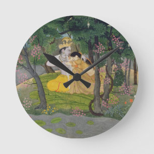 Radha and Krishna embrace in a grove of flowering Round Clock